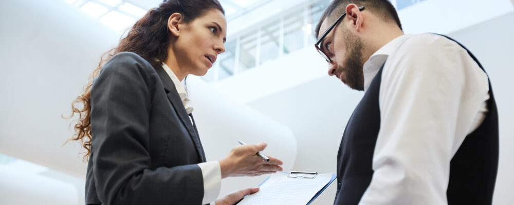 Man and woman discussing work